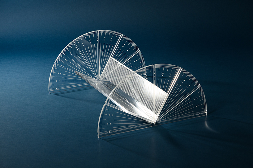 transparent measuring tools arrange floating orderly compositions by iyo hasegawa