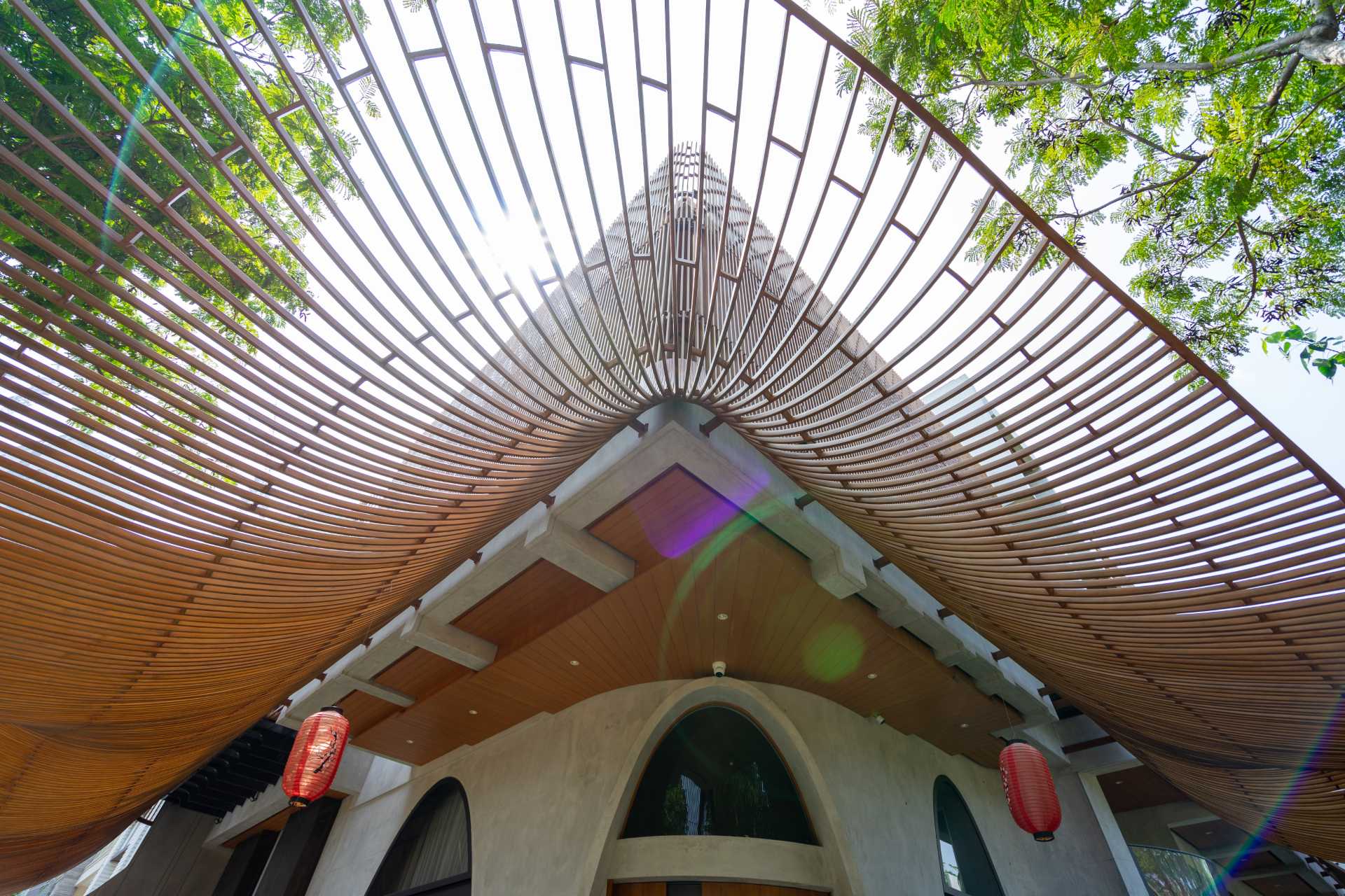 A modern home with operable steel fins on its exterior facade.