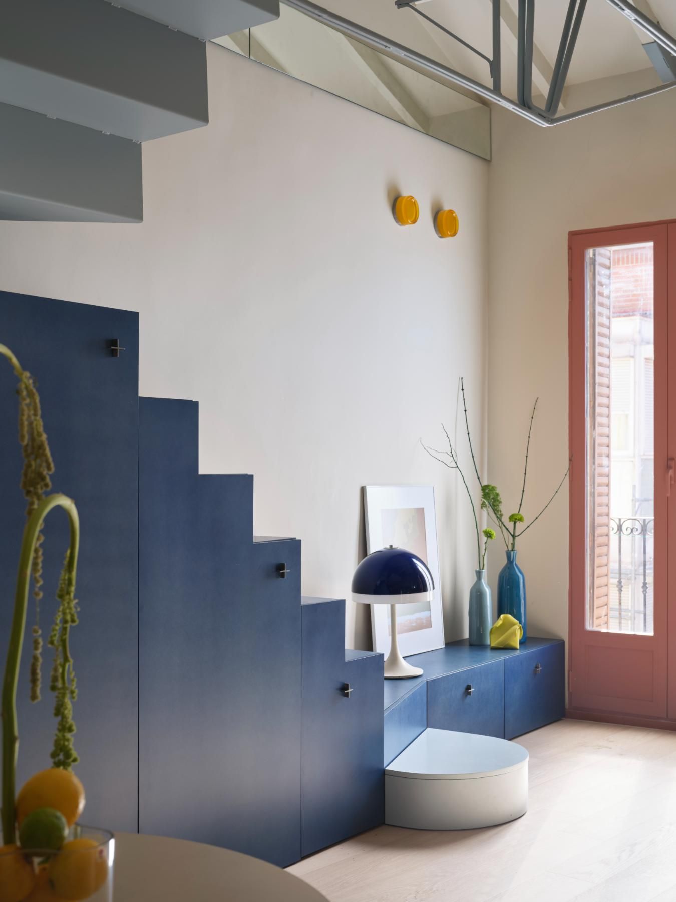 Image may contain Indoors Interior Design Architecture Building House Housing Staircase Lamp Foyer and Furniture