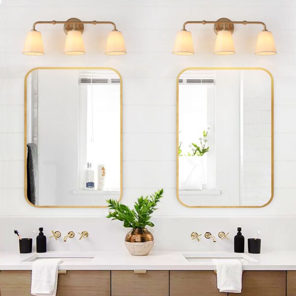 gold lightining above vanity