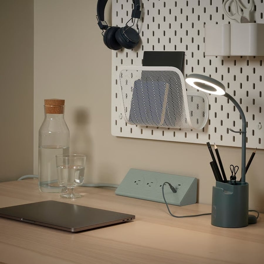 IKEA Just Made an Extension Cord You’ll Actually Want to Display 18 IKEA SKOTAT extension cord triangle shaped nests in corner