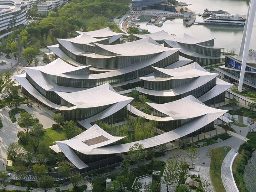 BIG's suzhou museum of contemporary art nears completion beneath ribbon-like roof