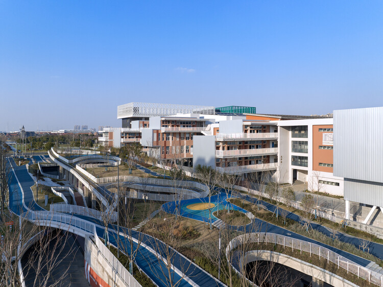 Expansion and Renovation of Primary School & Urban Infrastructure Multi-system Complex / Atelier Archmixing - More Images