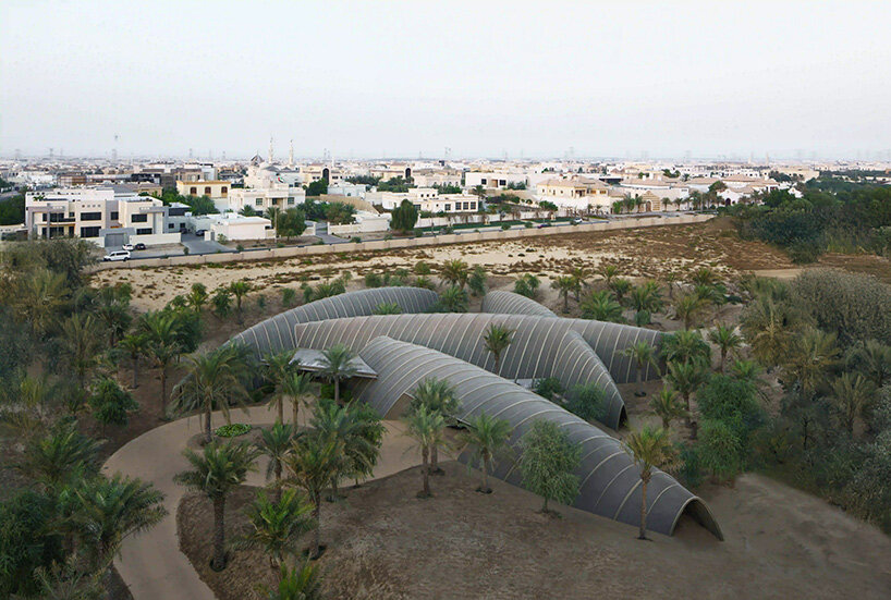 RCR arquitectes' house rises like a blooming structure of ribbed petals in the dubai desert