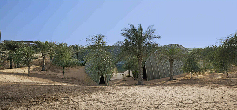 RCR arquitectes' house rises like a blooming structure of ribbed petals in the dubai desert