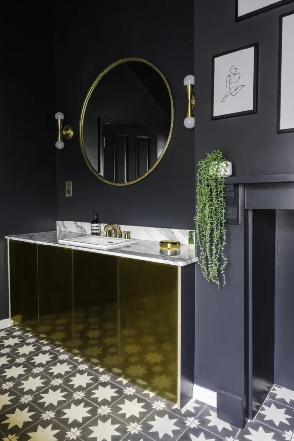 metallic accent for dark bathroom