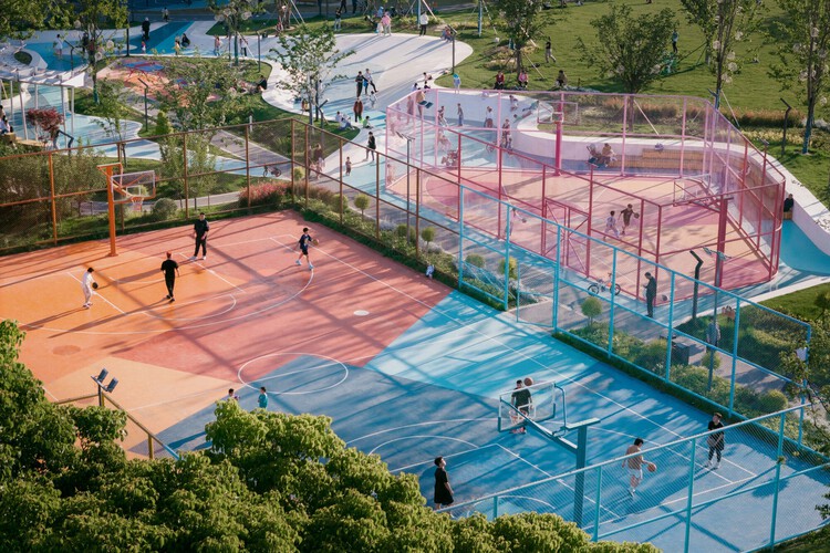 The Chromatic Canvas: 10 Vibrant Courts Activating Community Space - More Images