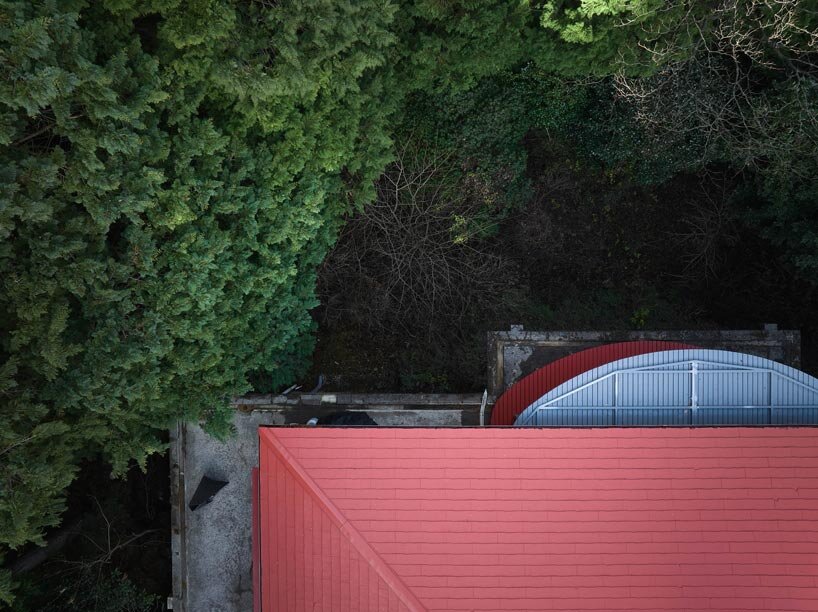 elevated circular veranda and canopy wrap 60-year-old restored japanese house